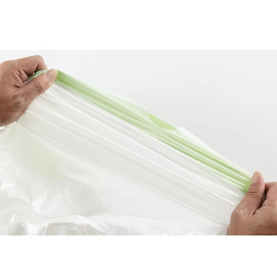 Hands holding an extra large drawstring litter box liner