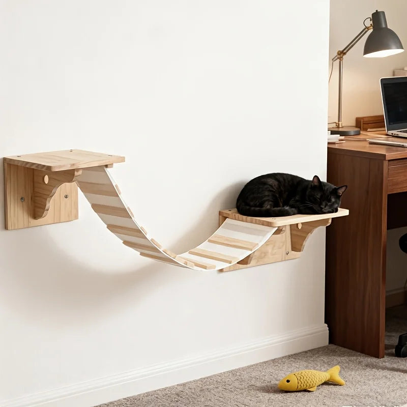 Cat wall shelves with bridge mounted in a home office, cat resting on the landing shelf