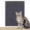 Self adhesive cat scratching carpet panel with a cat beside it