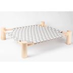 Raised cat bed with grey triangle canvas on a solid wood frame